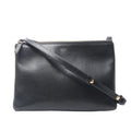 Celine Trio Small black leather crossbody bag with a rectangular shape, top zip closure, gold-tone logo and adjustable shoulder strap.
