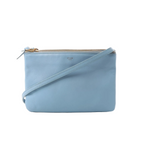 Celine Trio Small blue leather crossbody bag with zip-top closure, slim leather shoulder strap, and gold-tone zipper hardware.