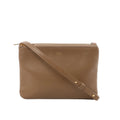 Brown Celine Trio Small leather crossbody bag with zip top and adjustable strap on white background.