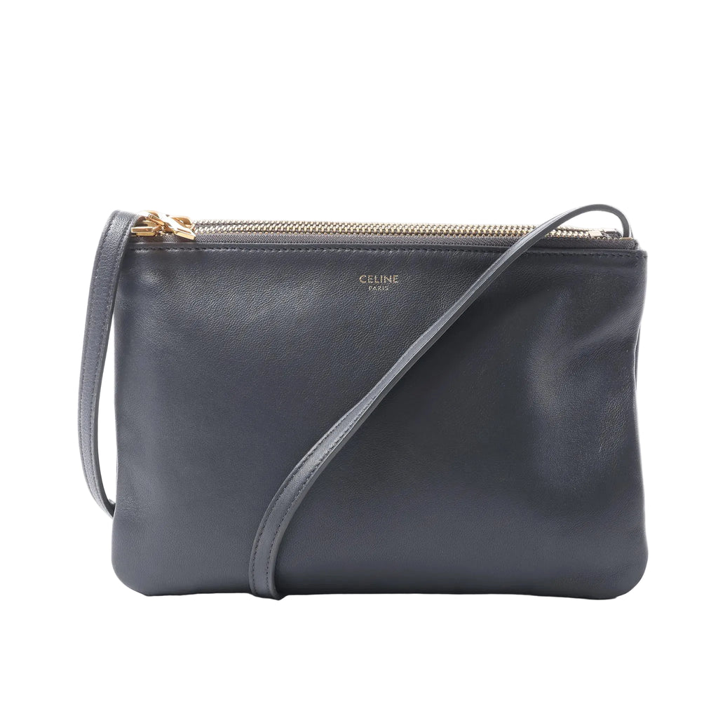 Celine Trio Small dark grey leather crossbody bag with three top zip compartments, gold-tone logo and slim adjustable shoulder strap.