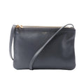 Celine Trio Small dark grey leather crossbody bag with three top zip compartments, gold-tone logo and slim adjustable shoulder strap.