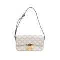 Beige Celine Triomphe Claude shoulder bag with repeating logo motif, gold-tone Triomphe clasp and slim brown adjustable strap.