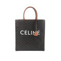 Front view of Celine Triomphe Vertical Cabas Large tote in black Triomphe-coated canvas with brown leather top handles and trim, large white CELINE logo, and hanging leather clochette.