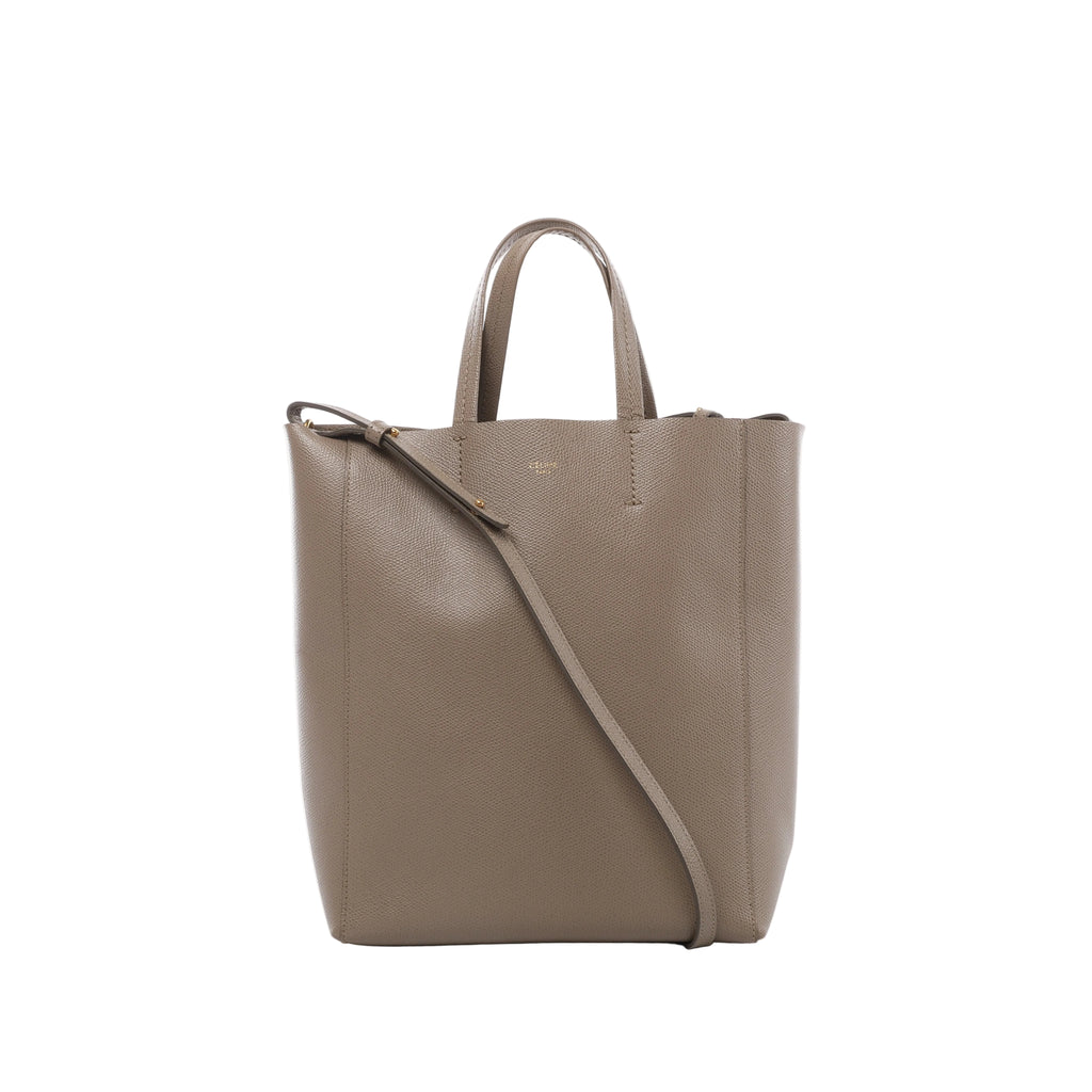 Front view of Celine Vertical Cabas Small beige grained leather handbag with twin top handles, matching shoulder strap and gold-tone logo.
