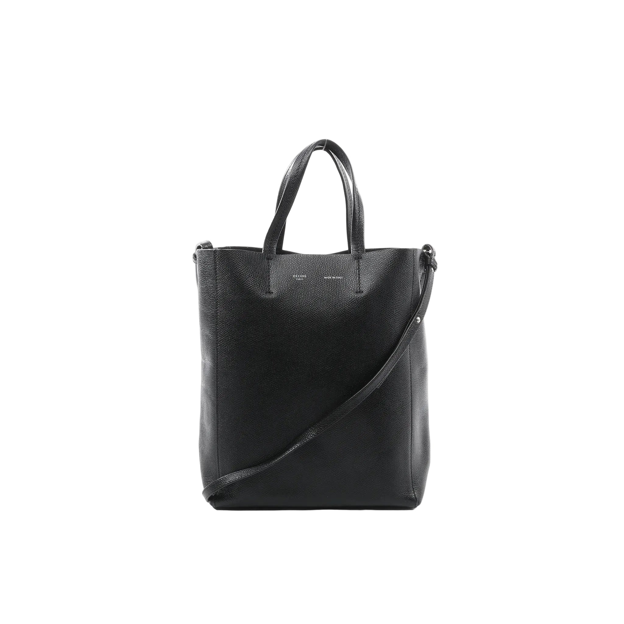 Black textured leather CELINE Cabas Vertical Small tote with two top handles and a long shoulder strap, front view on a white background.