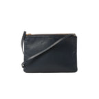 Black Celine Trio Large leather crossbody bag with gold-tone top zipper, slim strap, and small gold Celine Paris logo on front, on white background.