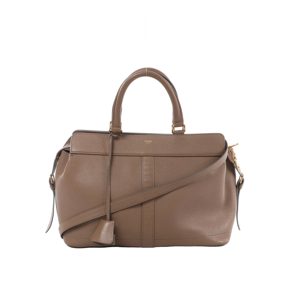 Brown CELINE Cabas de France leather handbag with pebbled texture, rounded top handles, long shoulder strap, hanging clochette and gold-tone hardware.