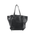 Black Celine Cabas Phantom Medium leather shoulder tote with two long top handles, open-top silhouette, and front panel with knotted leather tie details, shown on a white background.