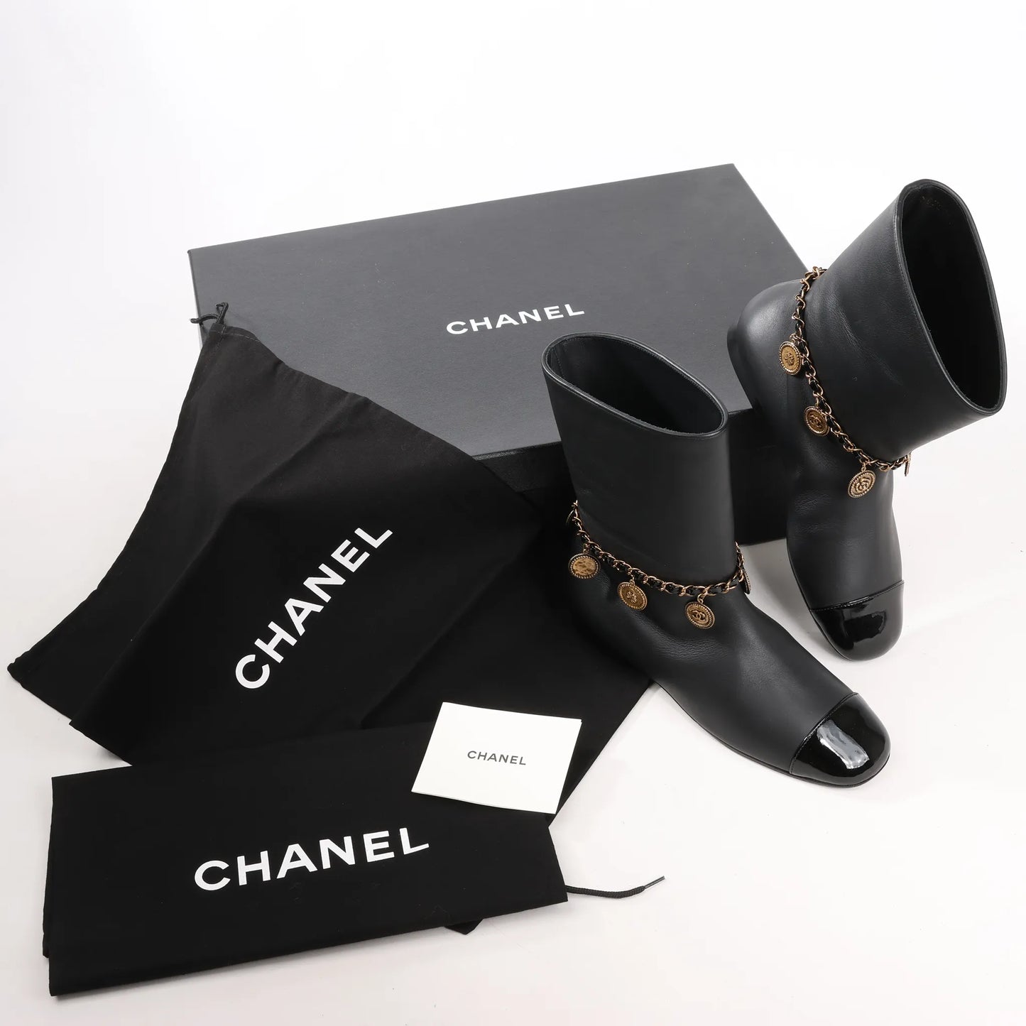 Chanel Coco Mark Camelia 17A Leather Ankle Boots in Black G32929, Size 36 EU
