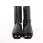 Chanel Coco Mark Camelia 17A Leather Ankle Boots in Black G32929, Size 36 EU