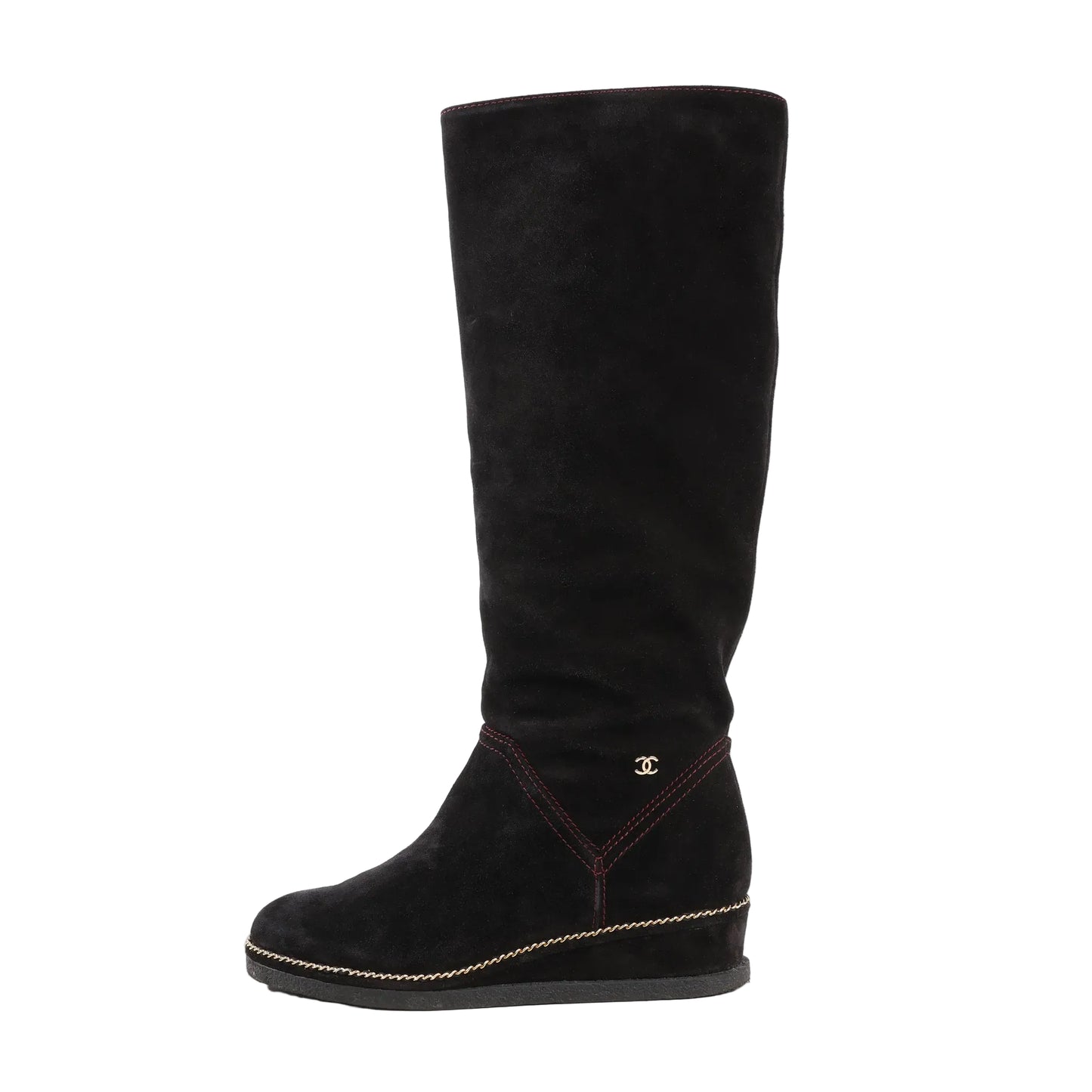 Chanel Coco Mark Chain 15B long boots in black suede, featuring a hidden wedge heel, gold-tone chain trim along the sole, red stitching, and small gold CC logo on the side. Size 36 EU.