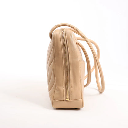 Sac à bandoulière en cuir à chevrons Chanel beige 1881694