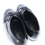 Sandalias tipo mule de piel con cadena Coco Mark de CHANEL en gris G35387, talla 40.5 EU