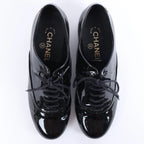 Sandalias tipo mule de piel con cadena Coco Mark de CHANEL en gris G35387, talla 40.5 EU