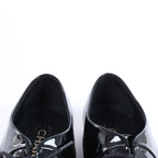 Sandalias tipo mule de piel con cadena Coco Mark de CHANEL en gris G35387, talla 40.5 EU