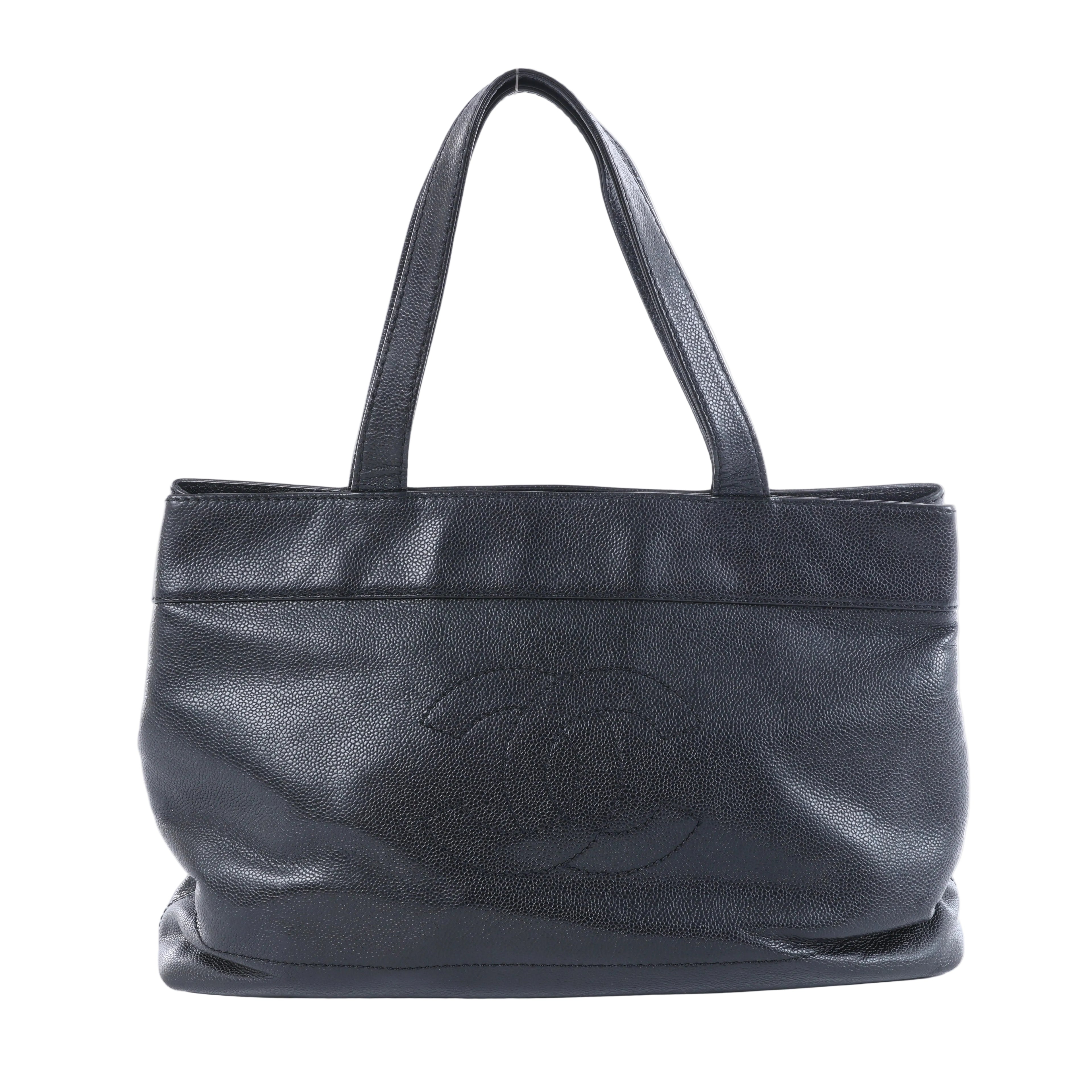 Chanel black Caviar leather tote bag with long shoulder handles, tonal interlocking CC logo and silver-tone snap closure.
