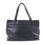 Chanel black Caviar leather tote bag with long shoulder handles, tonal interlocking CC logo and silver-tone snap closure.