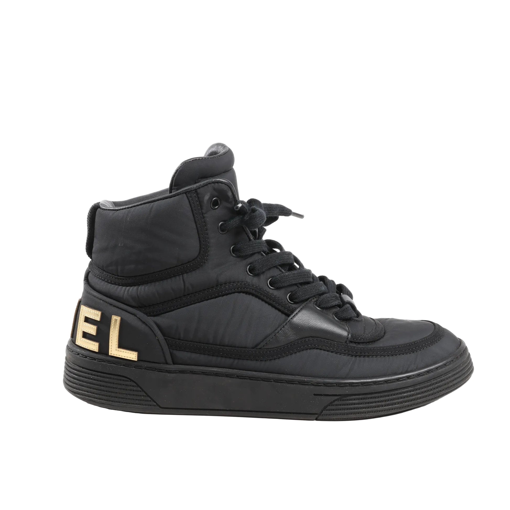 CHANEL Coco Mark High-top Sneakers G35062 in black fabric and leather with lace-up front, padded collar, and bold gold CHANEL lettering on the heel, shown in size 38 EU against a white background.