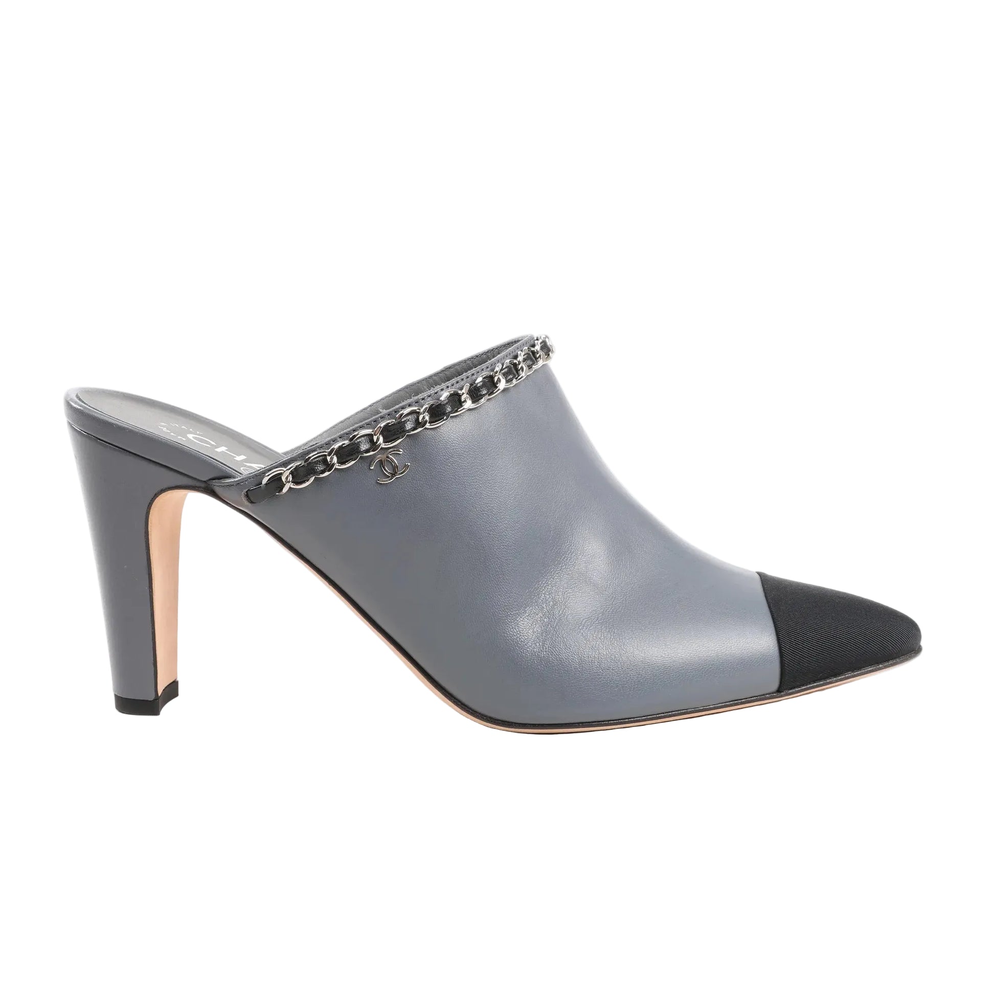 CHANEL Coco Mark mule sandals in gray leather with a black fabric cap toe, silver-tone chain trim along the top edge, and high heel. Slip-on style, size 40.5 EU.