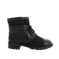 Side view of a black Chanel ankle boot with quilted suede panels, leather toe cap, stitched CC logo, black laces and a low block heel.