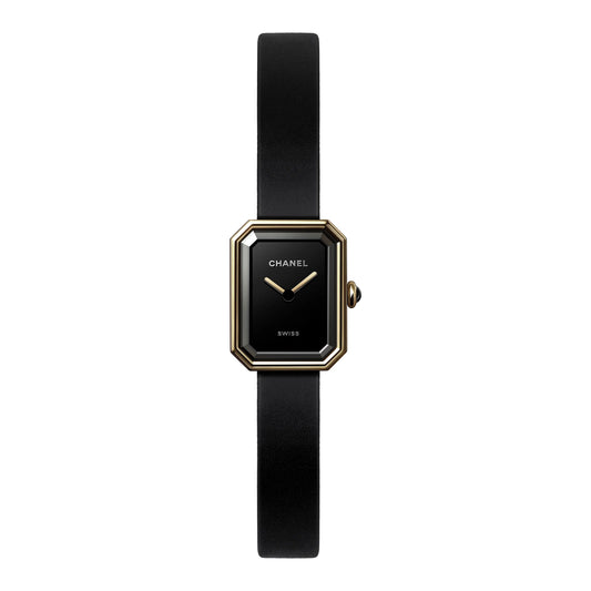 Front view of a Chanel Première H6125 watch featuring a black octagonal dial, 18K yellow gold titanium case, gold-tone hands, and a slim black rubber strap.