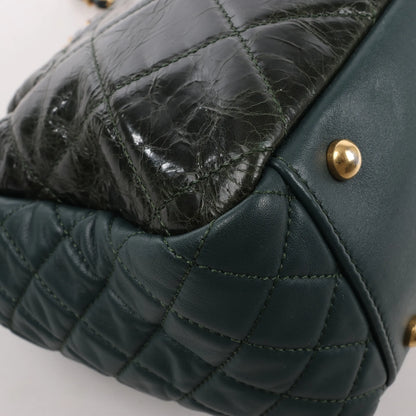 Chanel Reissue – Akkordeon-Schultertasche aus gestepptem Ledermix in Grün