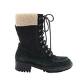 Chanel black suede lace-up boot with cream shearling cuff, metal eyelets and hook hardware, chunky lug sole, side view on white background