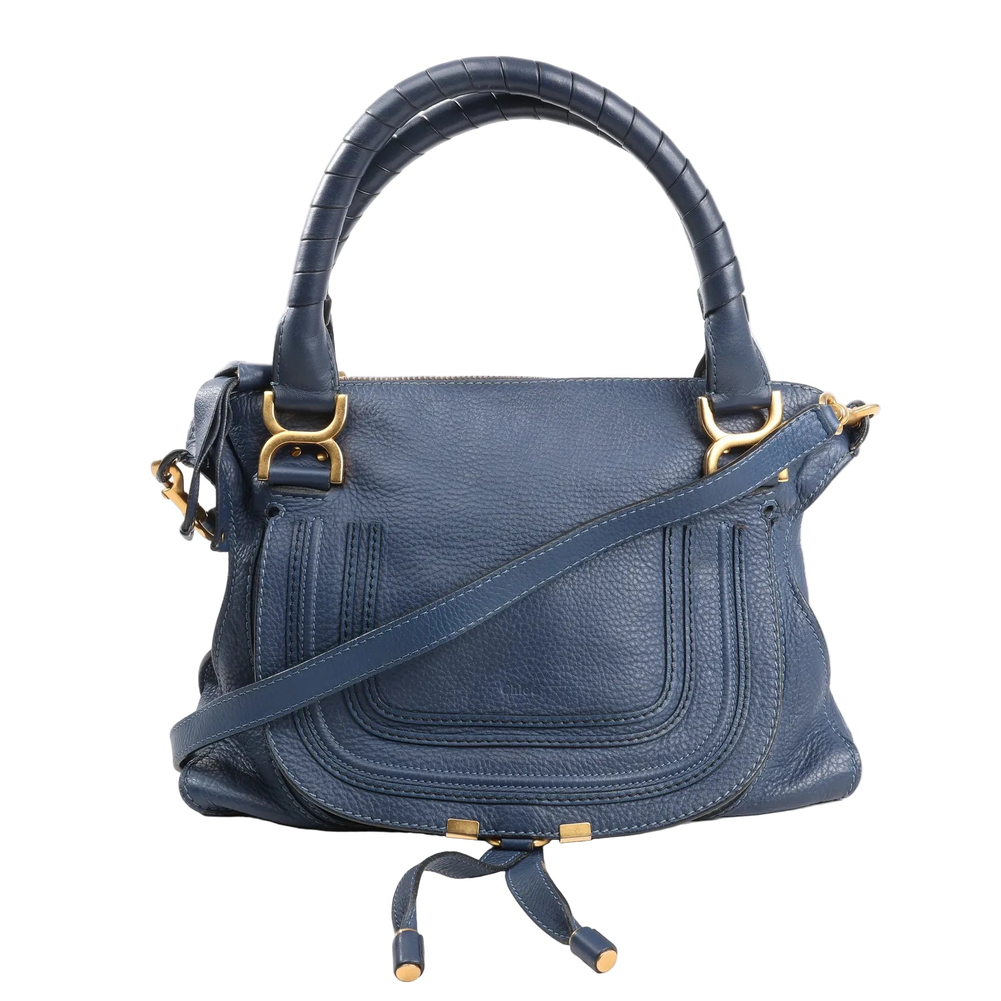 Chloé Marcie Medium handbag in navy blue grained leather with wrapped top handles, curved front stitching detail, gold-tone hardware, and a detachable shoulder strap for 2-way wear.