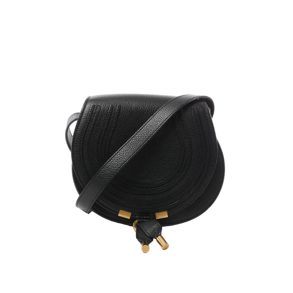 Black Chloé Marcie Mini leather crossbody bag with rounded stitched flap, gold-tone hardware accents, and adjustable shoulder strap.
