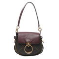 Chloé Tess shoulder bag in dark green and Bordeaux leather and suede with gold-tone ring hardware, embossed flap and decorative stud detailing.