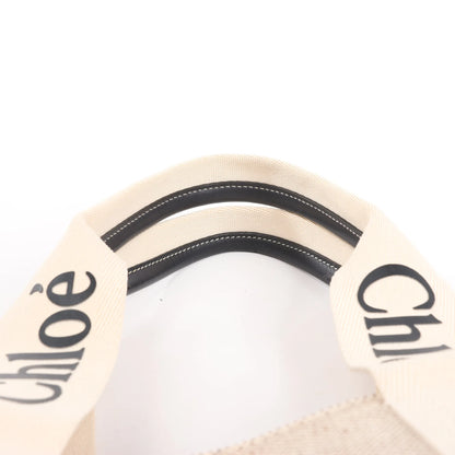 Grand sac fourre-tout en toile et cuir CHLOE Woody, noir et beige