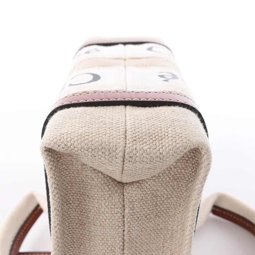 Bolso de mano de lona y piel Chloé Woody Nano de 2 vías en beige y marrón