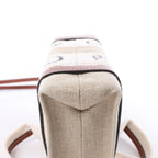 Bolso de mano de lona y piel Chloé Woody Nano de 2 vías en beige y marrón