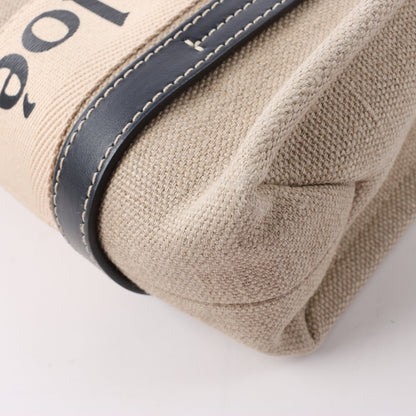 Chloé Woody Kleine 2-Wege-Handtasche aus Canvas und Leder in Beige x Schwarz