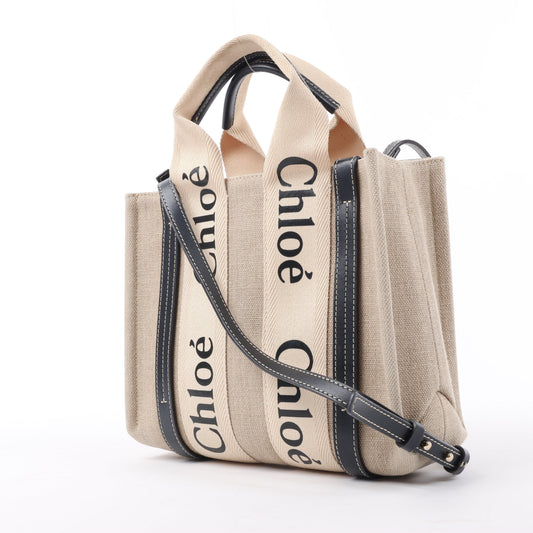 Chloé Woody Kleine 2-Wege-Handtasche aus Canvas und Leder in Beige x Schwarz