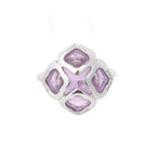 Chopard Impériale white gold ring with four cushion-cut purple amethyst stones and diamond accents on a white background