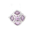 Chopard Impériale white gold ring with four cushion-cut purple amethyst stones and diamond accents on a white background