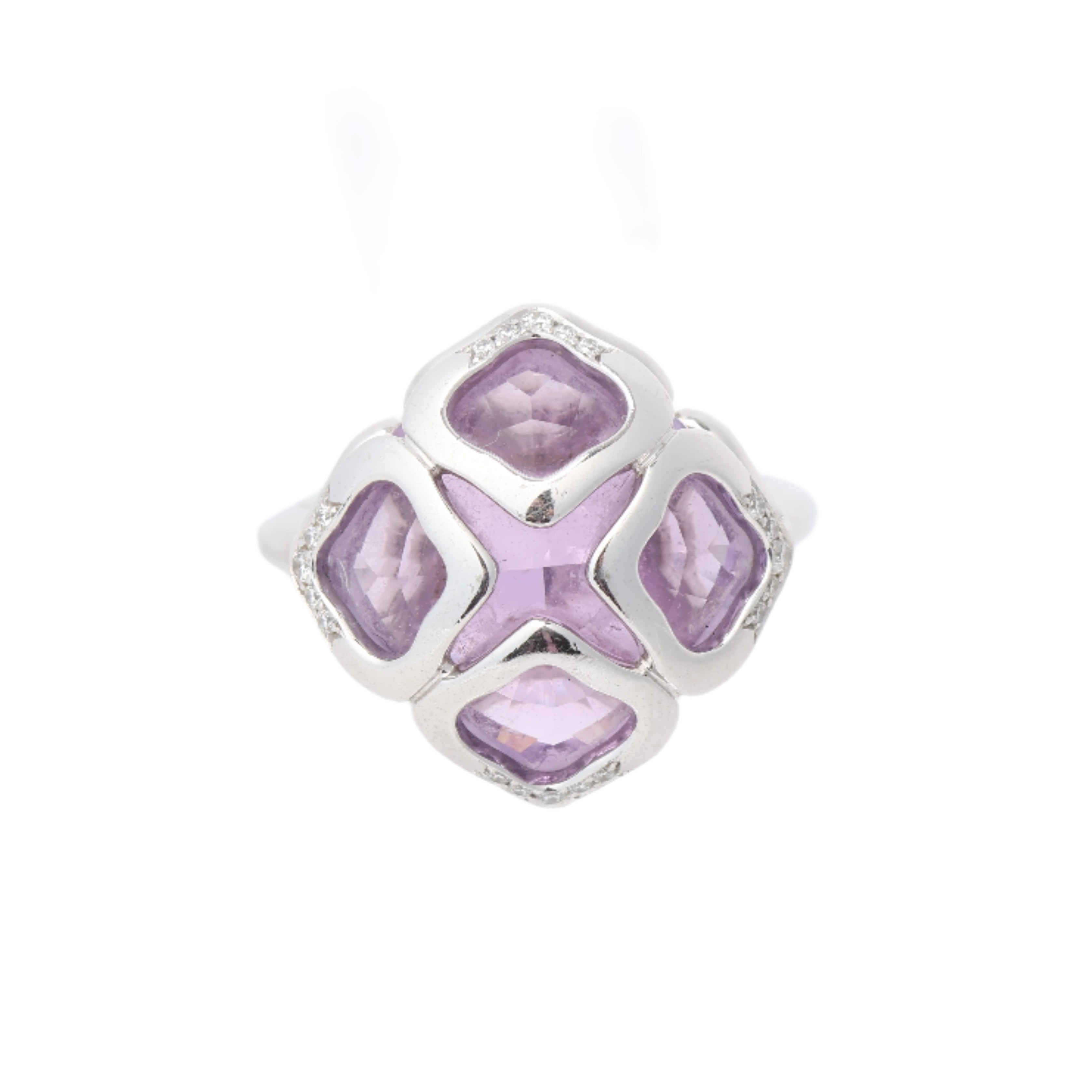 Chopard Impériale white gold ring with four cushion-cut purple amethyst stones and diamond accents on a white background