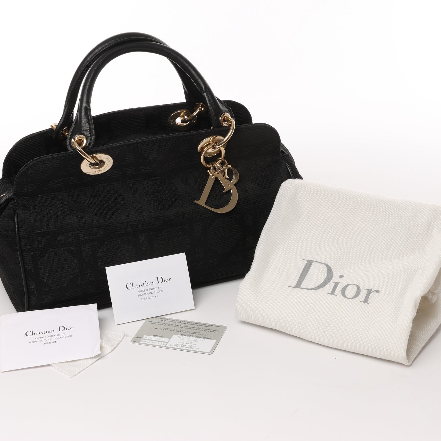 Christian Dior – Macros Cannage Coating Canvas-Handtasche in Schwarz