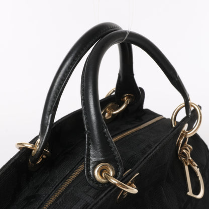 Christian Dior – Macros Cannage Coating Canvas-Handtasche in Schwarz