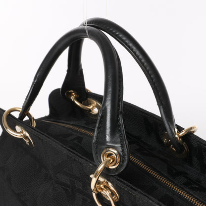 Christian Dior – Macros Cannage Coating Canvas-Handtasche in Schwarz