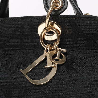 Christian Dior – Macros Cannage Coating Canvas-Handtasche in Schwarz