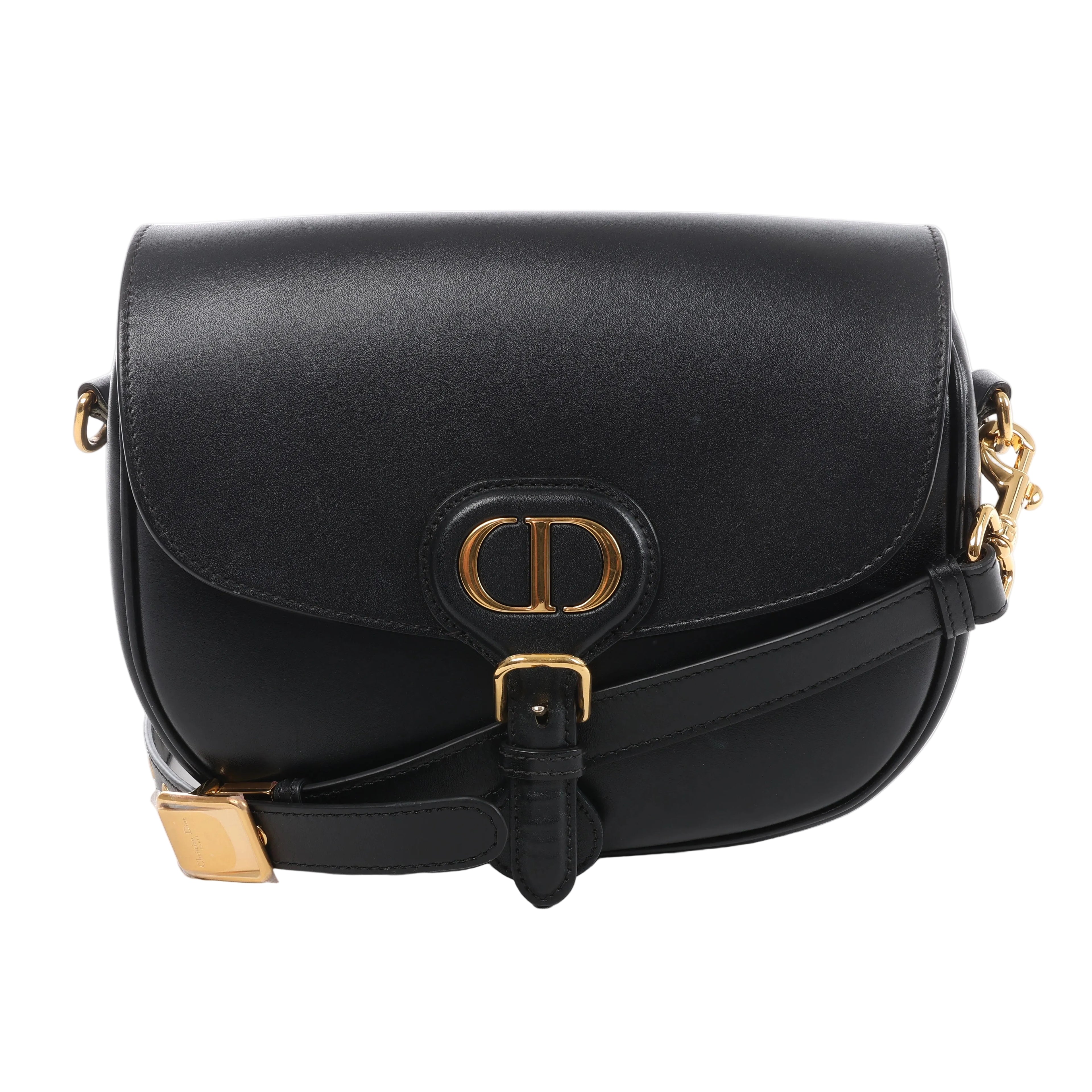 Black Christian Dior Bobby leather crossbody bag with curved flap, adjustable leather shoulder strap and gold-tone CD logo hardware.