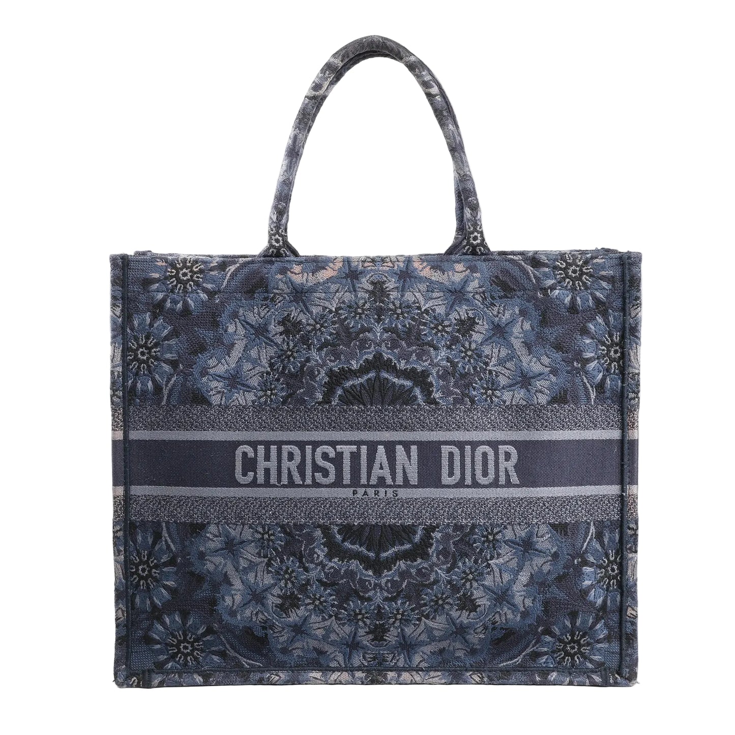 Christian Dior Book Tote Large shoulder bag in navy blue Kaleidiorscopic embroidered canvas with intricate symmetrical patterns, top handles, and bold "Christian Dior Paris" logo across the front.