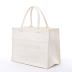 Bolso de hombro grande de lona Dior Book Tote en negro y blanco