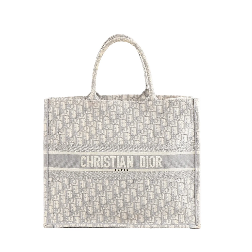Dior Book Tote Large gray Oblique canvas tote with allover monogram pattern and “CHRISTIAN DIOR PARIS” logo band across front