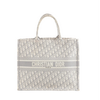 Dior Book Tote Large gray Oblique canvas tote with allover monogram pattern and “CHRISTIAN DIOR PARIS” logo band across front