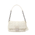 White Christian Dior New Lock shoulder bag with Cannage quilting, a silver-tone chain strap, leather shoulder section and Dior clasp.