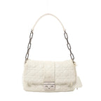 White Christian Dior New Lock shoulder bag with Cannage quilting, a silver-tone chain strap, leather shoulder section and Dior clasp.