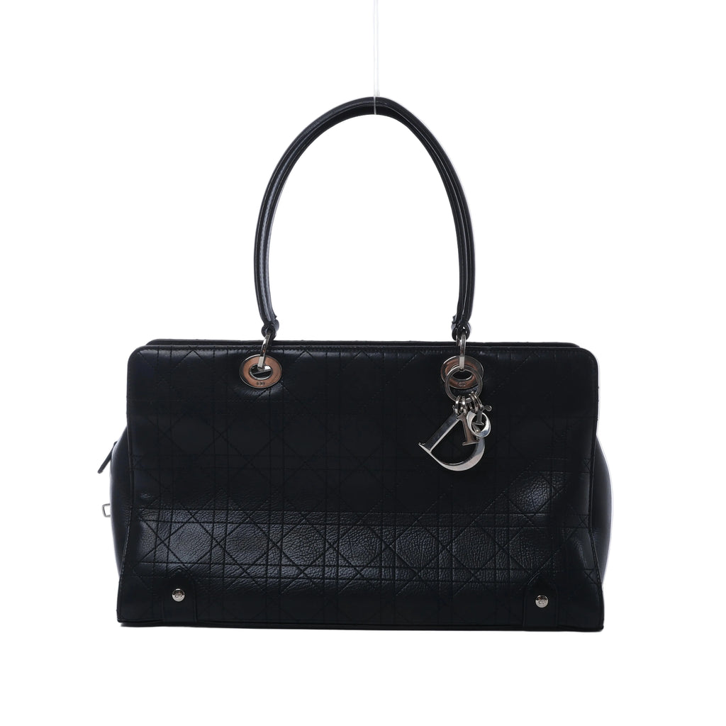 Black Christian Dior East-West Lady Dior leather bag with Cannage quilting, long top handles and silver-tone DIOR letter charms.